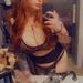 Ariel in Las Vegas taking a mirror selfie in black lingerie 